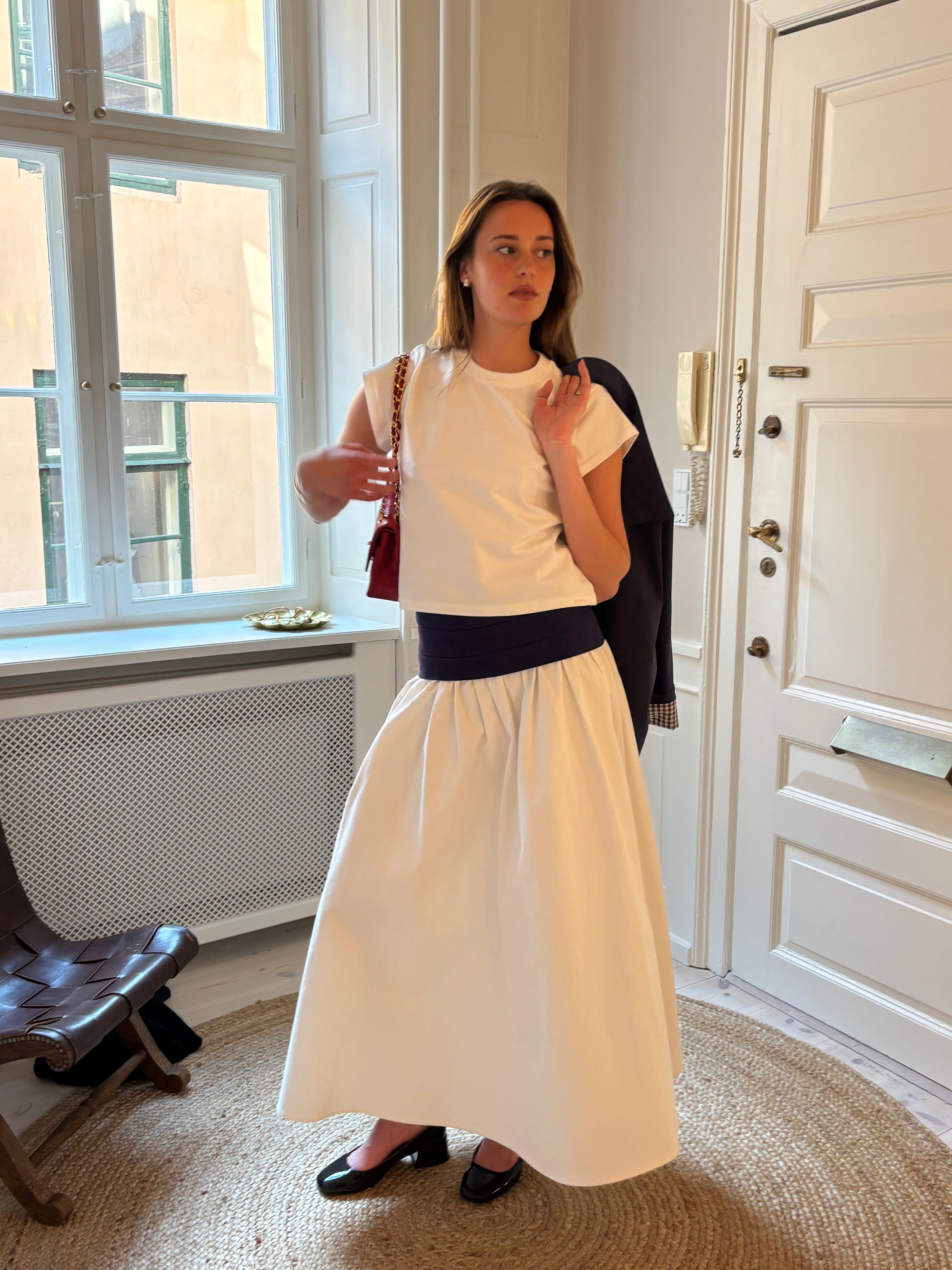 Mila Meloche wearing the Cotton tee white with Mimi Maxi Skirt